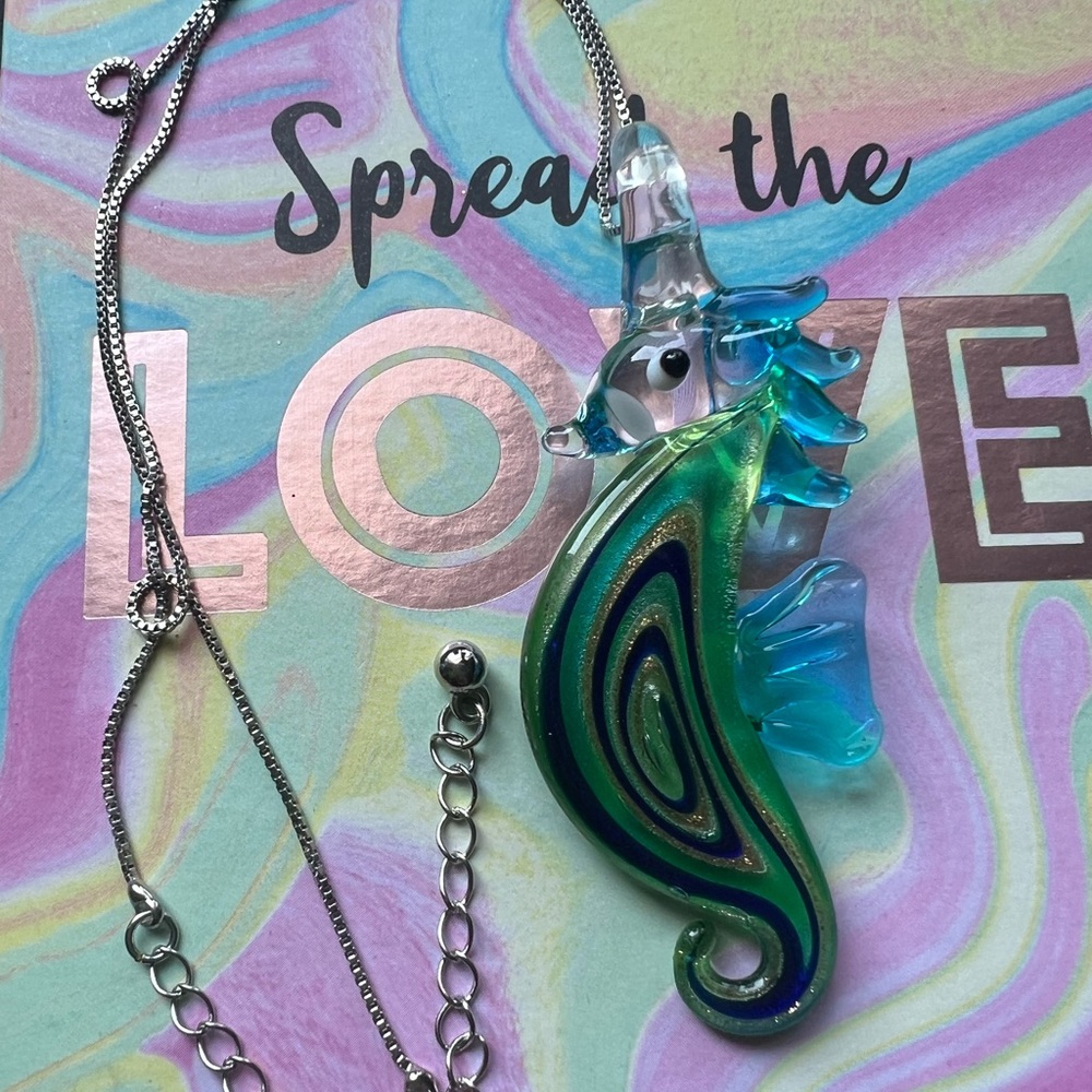 This is a handmade necklace with a seahorse pendant!!